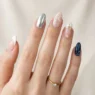 Collection of trending nail designs including French tips chrome accents and various nail art styles